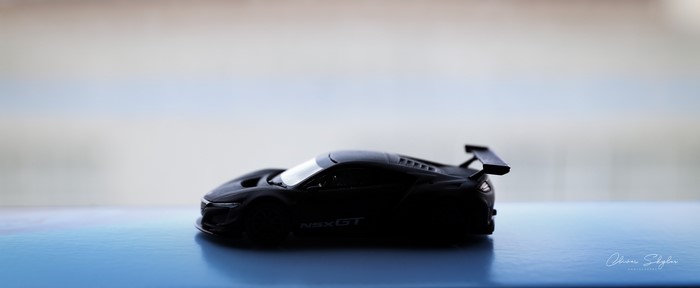 Black Acura NSX GT toy car side view