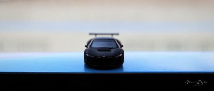 Black Acura NSX GT3 toy car with spoiler