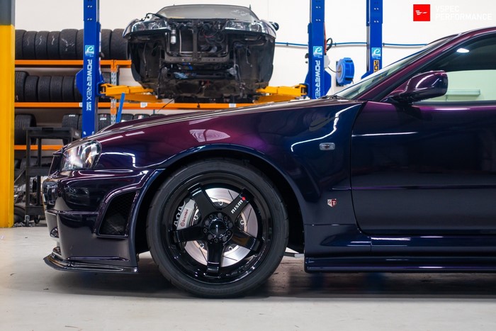 Nissan Skyline GT-R R34 Nismo in a workshop
