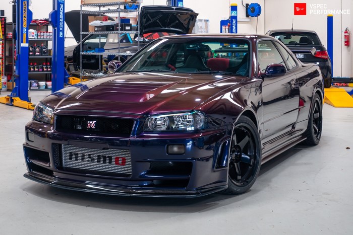 Nissan Skyline GT-R R34 Nismo in a workshop