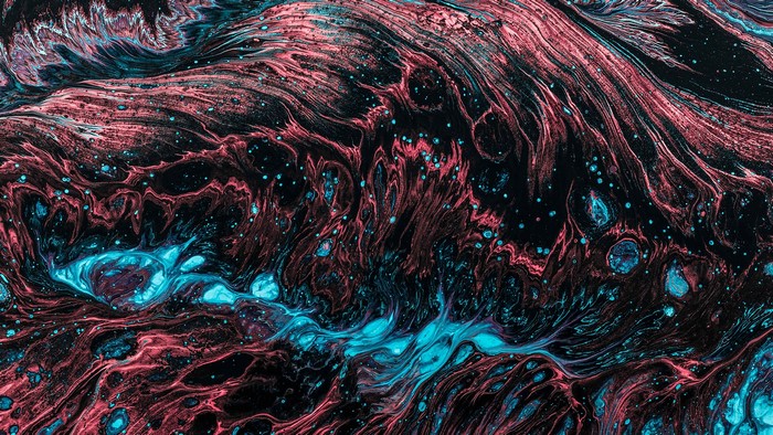 Abstract fluid art with pink and blue swirls