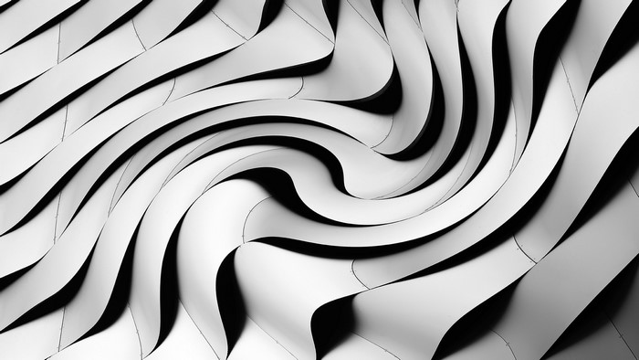 Abstract monochrome wavy metal architecture texture