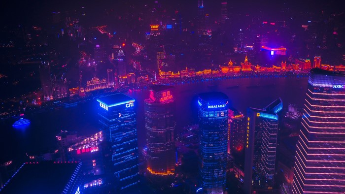 Shanghai skyline at night with neon lights