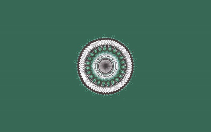 Mandala artwork on a green background