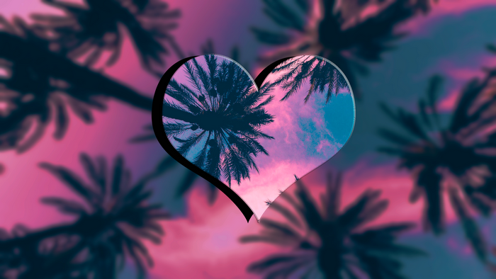 Heart shape with palm trees and colorful sky