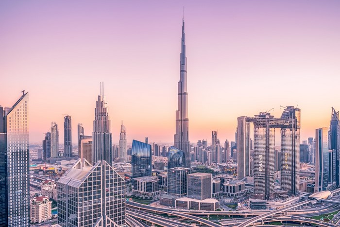 Dubai cityscape with Burj Khalifa at sunset