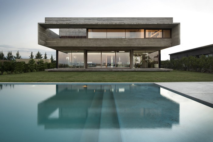 Modern concrete house with swimming pool