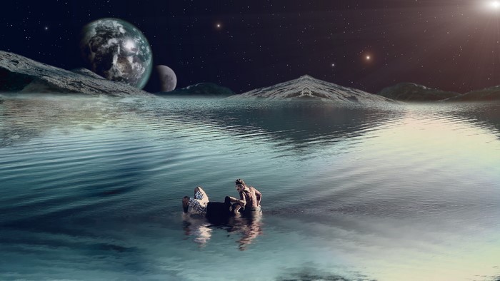 Couple floating on a raft in a cosmic lake