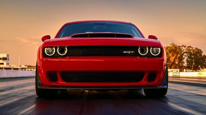 Red Dodge Challenger SRT on a race track