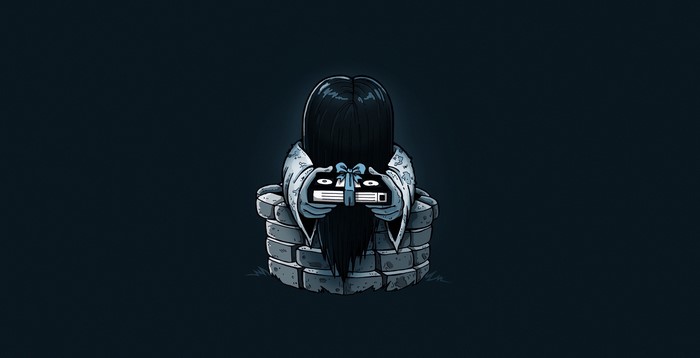 Sadako from The Ring holding a VHS tape