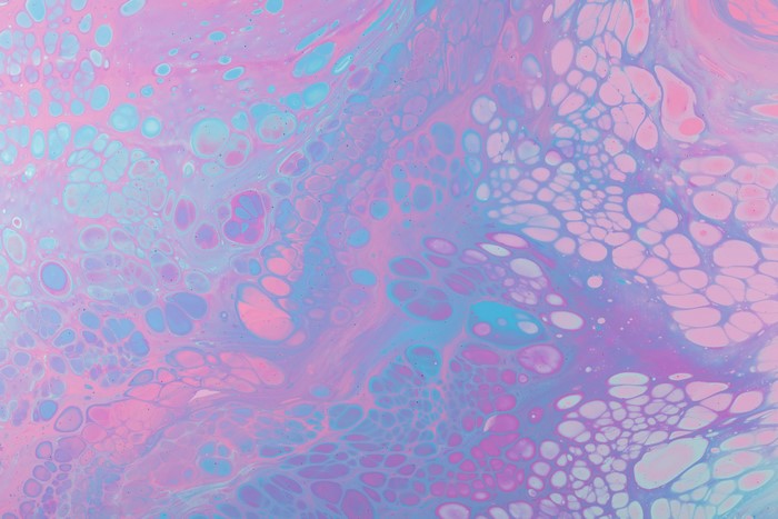 Abstract pink, purple, and blue paint splatter