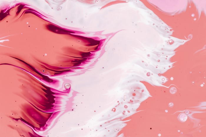 Abstract pink and white paint splatter