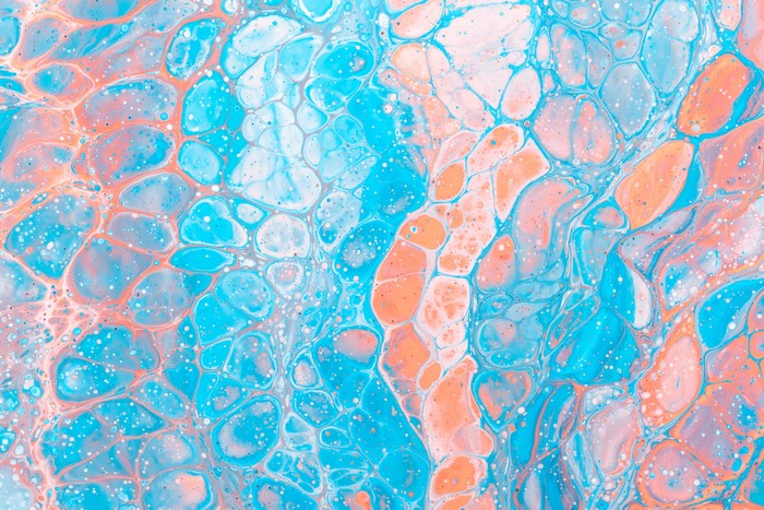 Abstract paint splash with orange and cyan