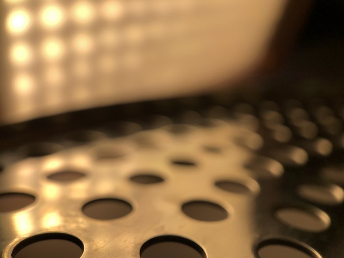 Sepia toned metal with bokeh effect