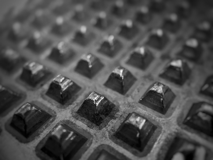 Close-up of a metal grater surface