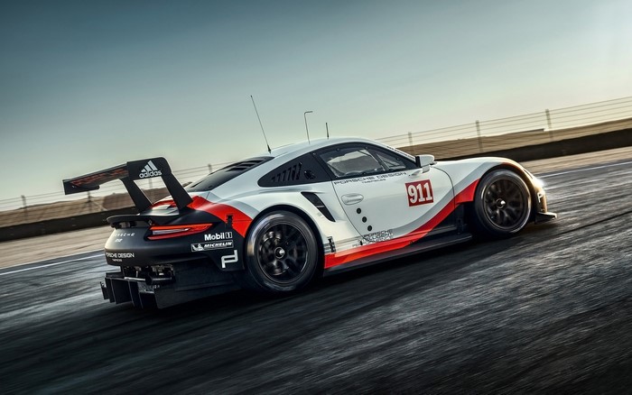 Porsche 911 RSR race car on a track