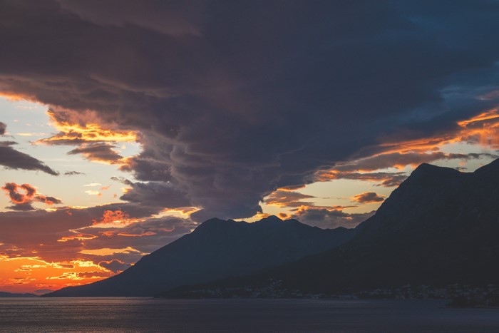 Dramatic sunset over mountains and sea in Croatia