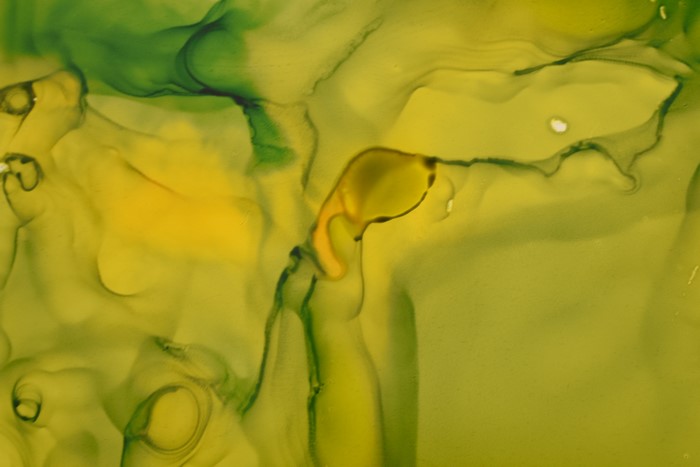 Abstract green and yellow ink painting