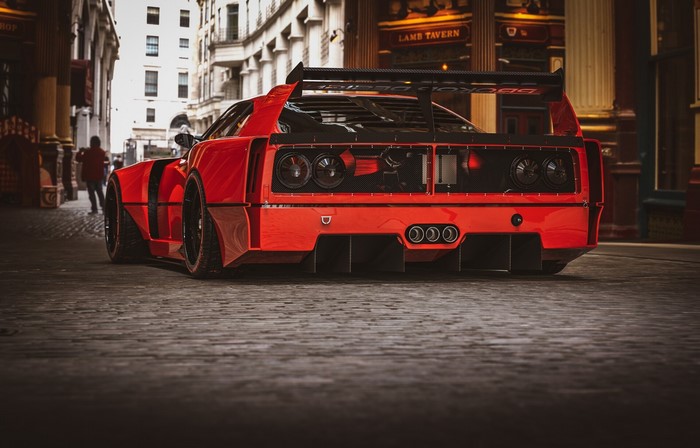 Red Ferrari F40 modified in a city street