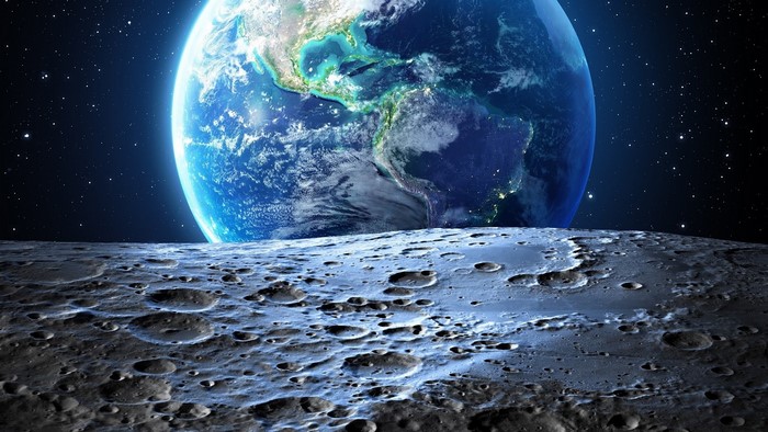 Earth Rising Over Moon's Cratered Surface