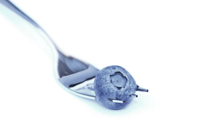 Blueberry on a fork