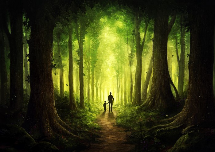Father and child walking in a sunlit forest