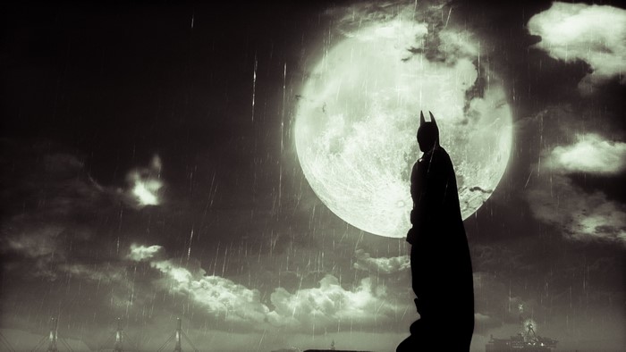 Batman from Batman: Arkham Knight in front of the moon