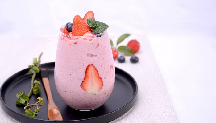 Strawberry and berry smoothie in a glass