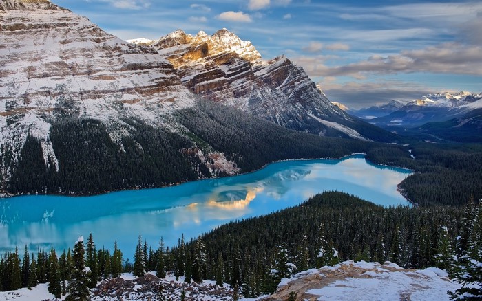 Peyto Lake and snowy mountains in Canada