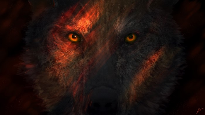 Close-up of a wolf's face with glowing eyes