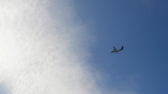 4K De Havilland Dash 8 airplane in the sky