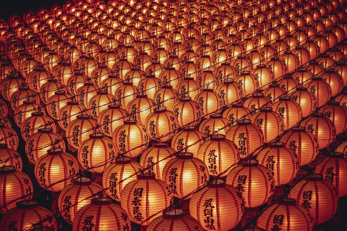 Rows of illuminated orange lanterns