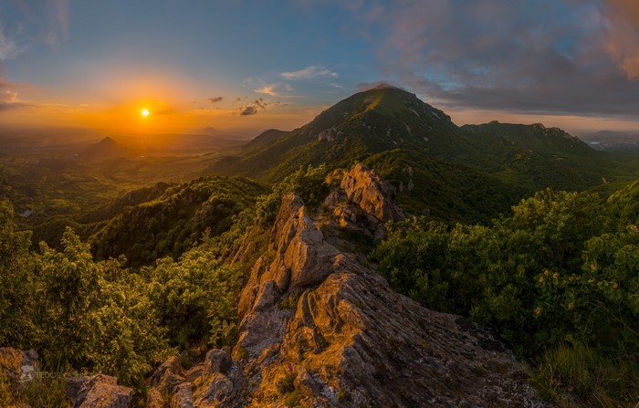 Mountains at sunset with rocky ridge