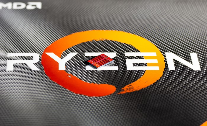 AMD RYZEN CPU integrated circuit on a textured surface