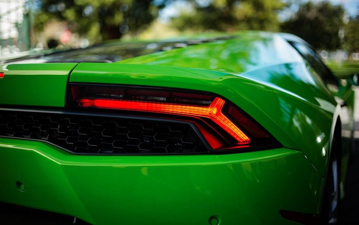 Green Lamborghini Huracan taillight close-up
