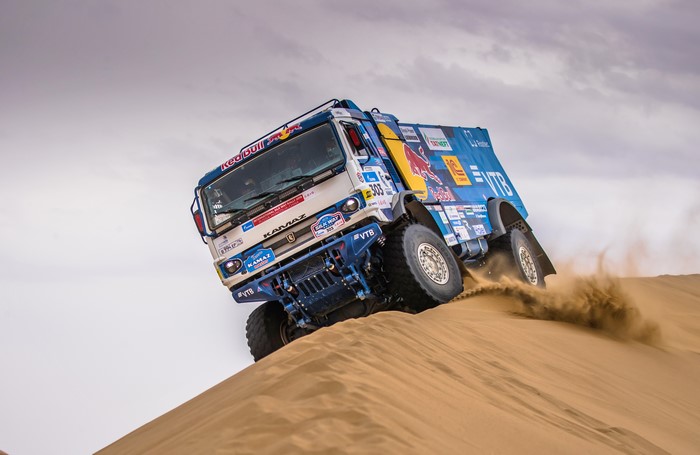 Kamaz truck racing on sand dunes