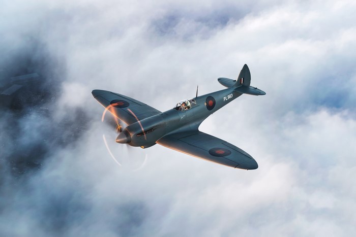 Supermarine Spitfire PL983 flying through clouds