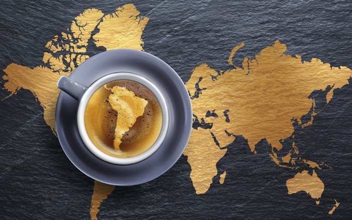 Coffee cup with South America on world map