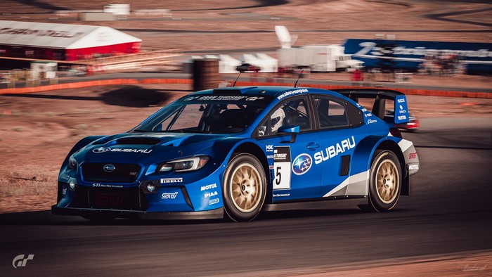 Blue Subaru WRX STI race car on track
