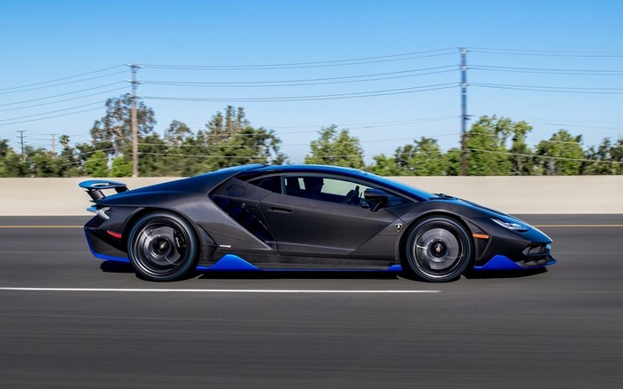 Lamborghini Centenario driving on a highway