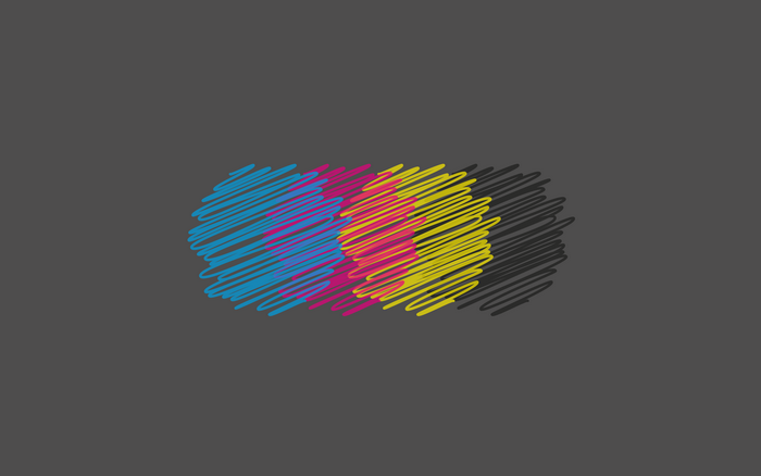 Abstract CMYK scribbles on a dark background