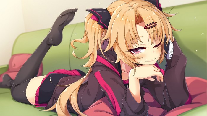 Anime girl with blonde ponytail lying on couch