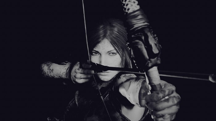 Lara Croft from Shadow of the Tomb Raider aiming a bow