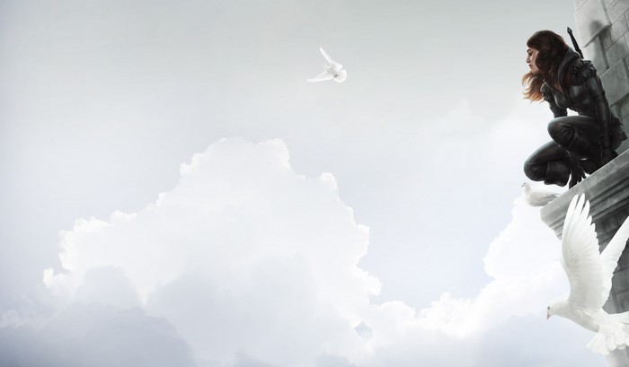 Fantasy girl on a ledge with doves