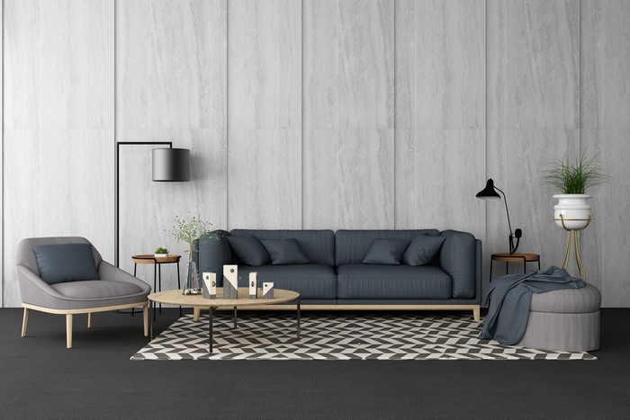 Modern living room with gray sofa and armchair