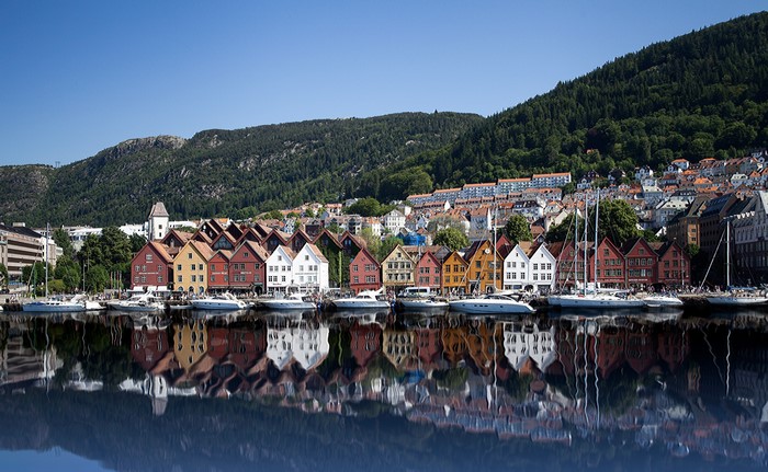 Bryggen waterfront in Bergen, Norway with reflections