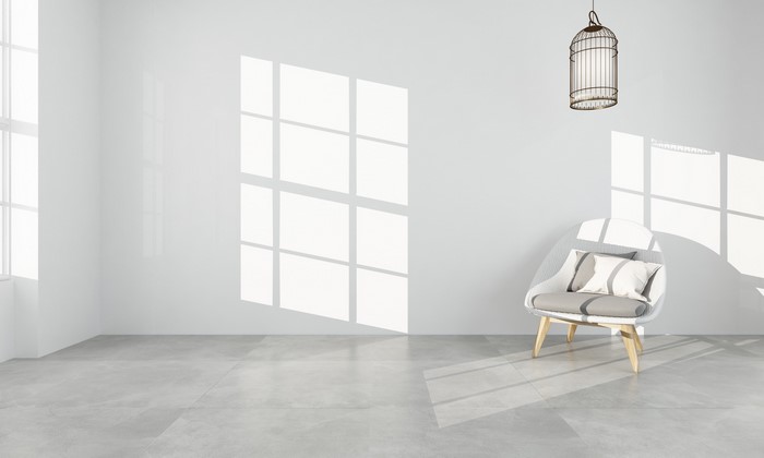 Minimalist room with chair and birdcage lamp