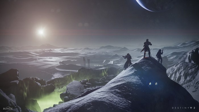 Guardians on a rocky alien planet in Destiny 2