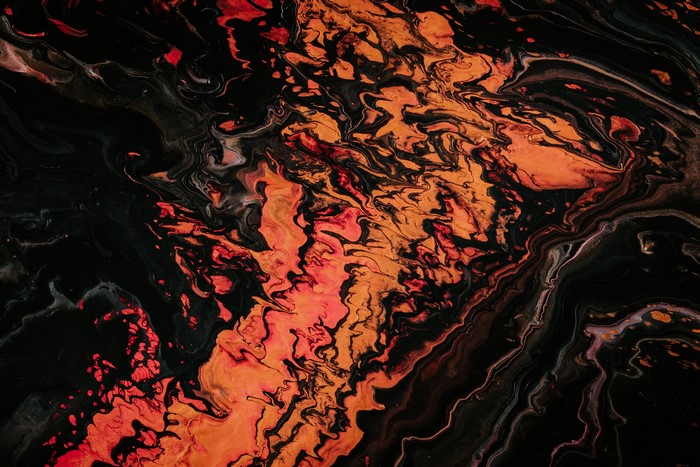 4K abstract paint splash with orange and black