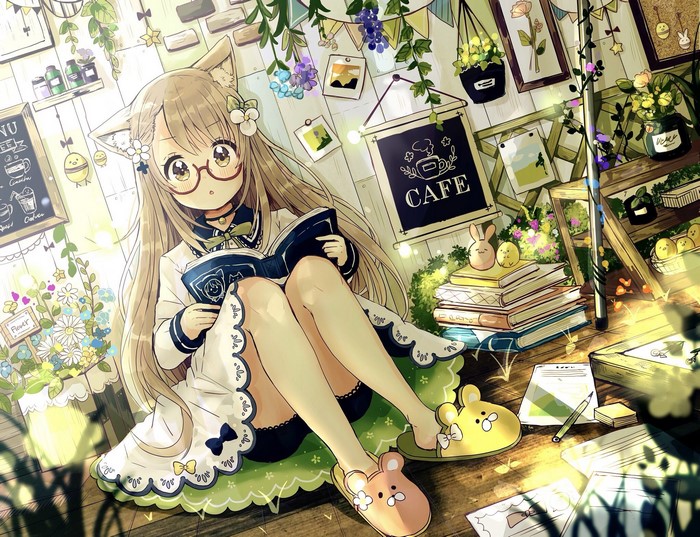Anime girl with cat ears reading a book in a cafe